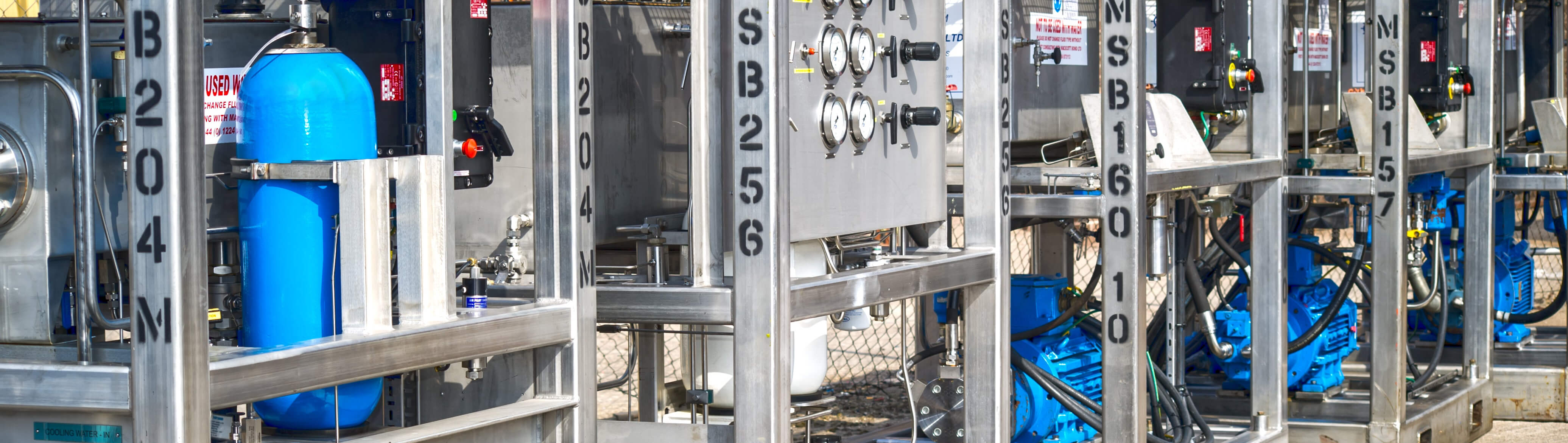 Row of ATEX Flushing Rigs with accumulators
